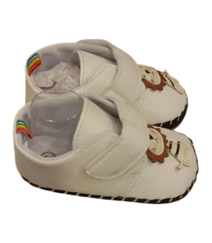 White Baby Shoes With a Cartoon Lion Appliqué